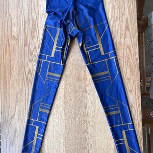 Goldsheep leggings size XS.  Electric blue with gold detail